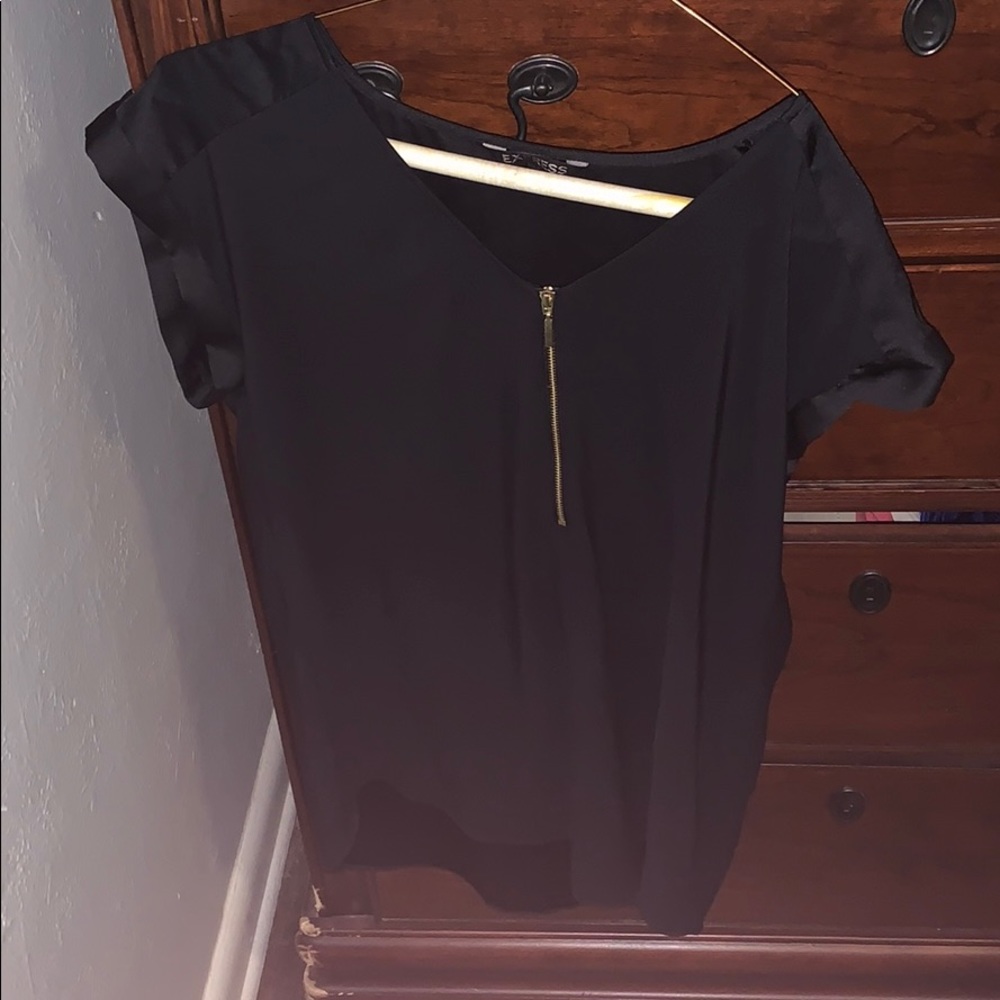 Express short sleeved blouse with gold zipper.